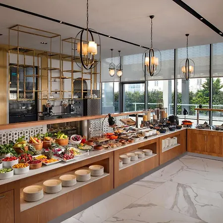 Отель Movenpick Living West