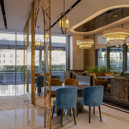 Отель Movenpick Living West